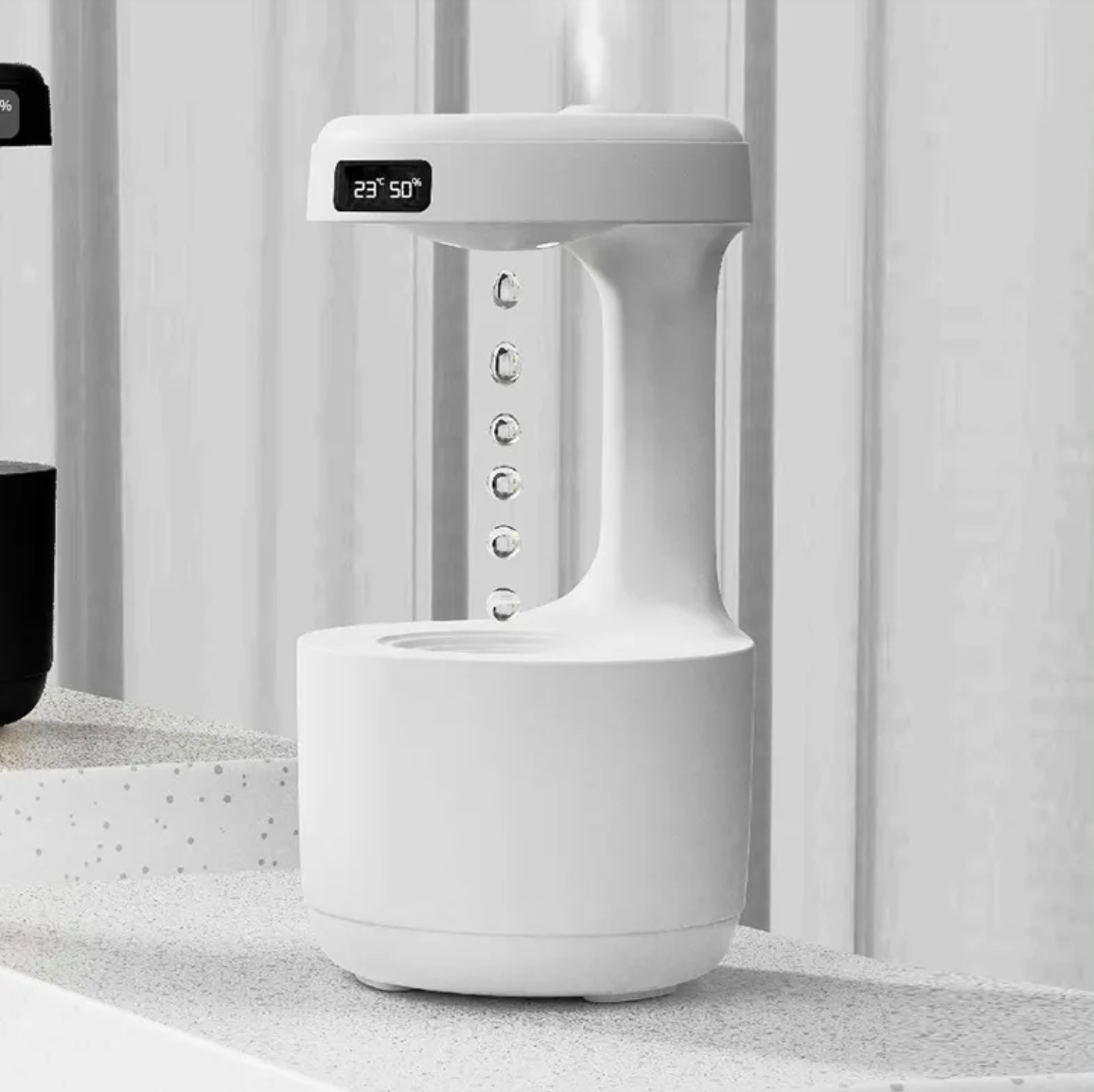 Anti-Gravity Humidifier/ Aroma Diffuser With Clock Water Drops