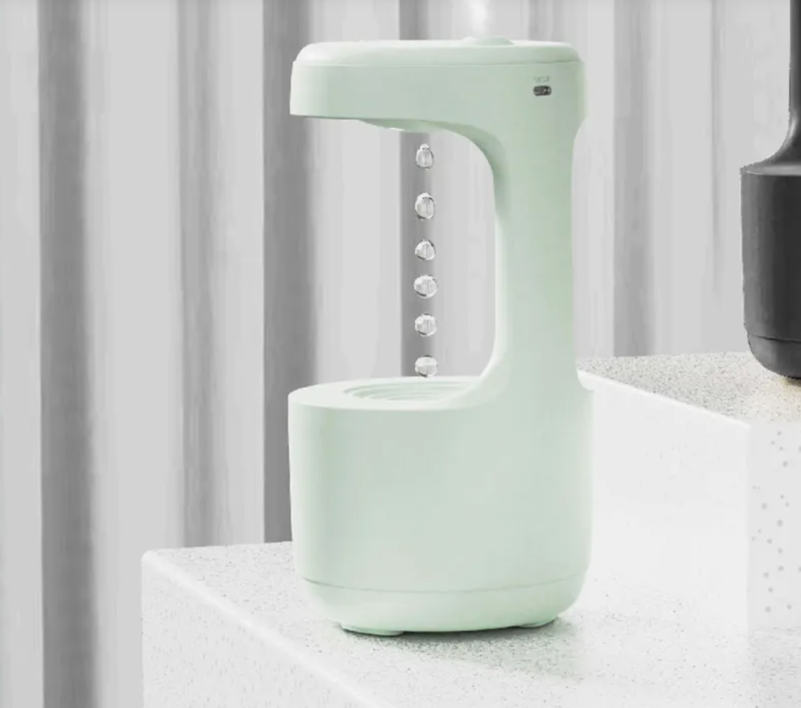 Anti-Gravity Humidifier/ Aroma Diffuser With Clock Water Drops