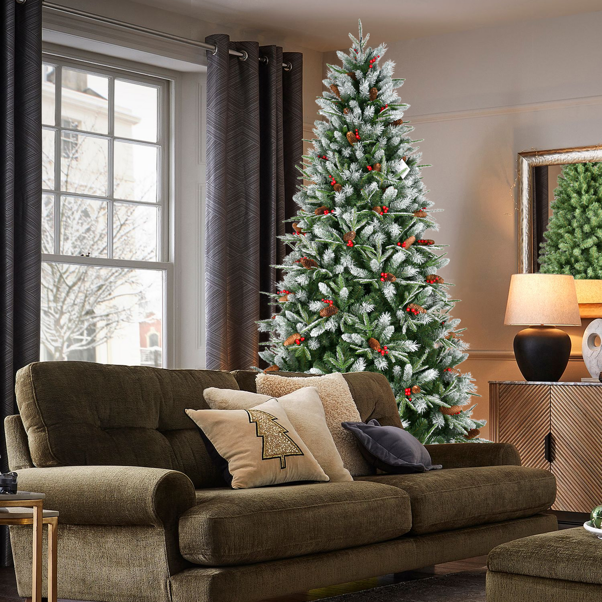 Snow-Tipped Pine Christmas Tree beside a sofa