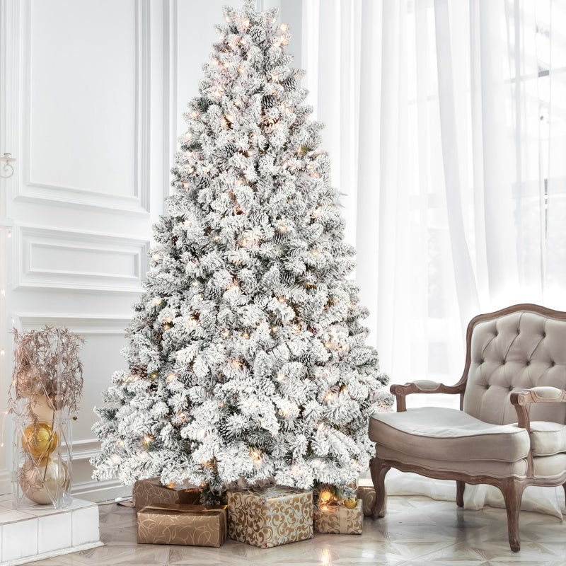 Flocked Pre-Lit Christmas Tree beside an armchair