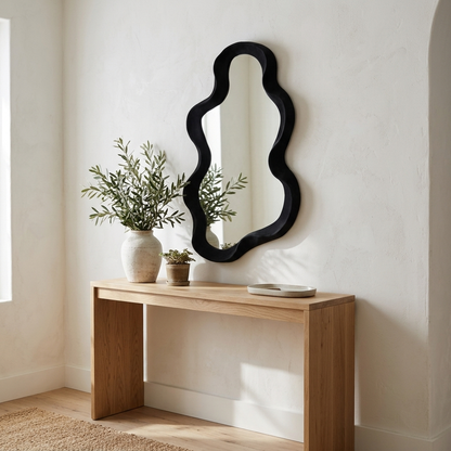 Wavy cloud mirror above an entryway console